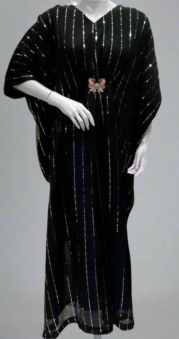 Black dress with white stripes on a mannequin