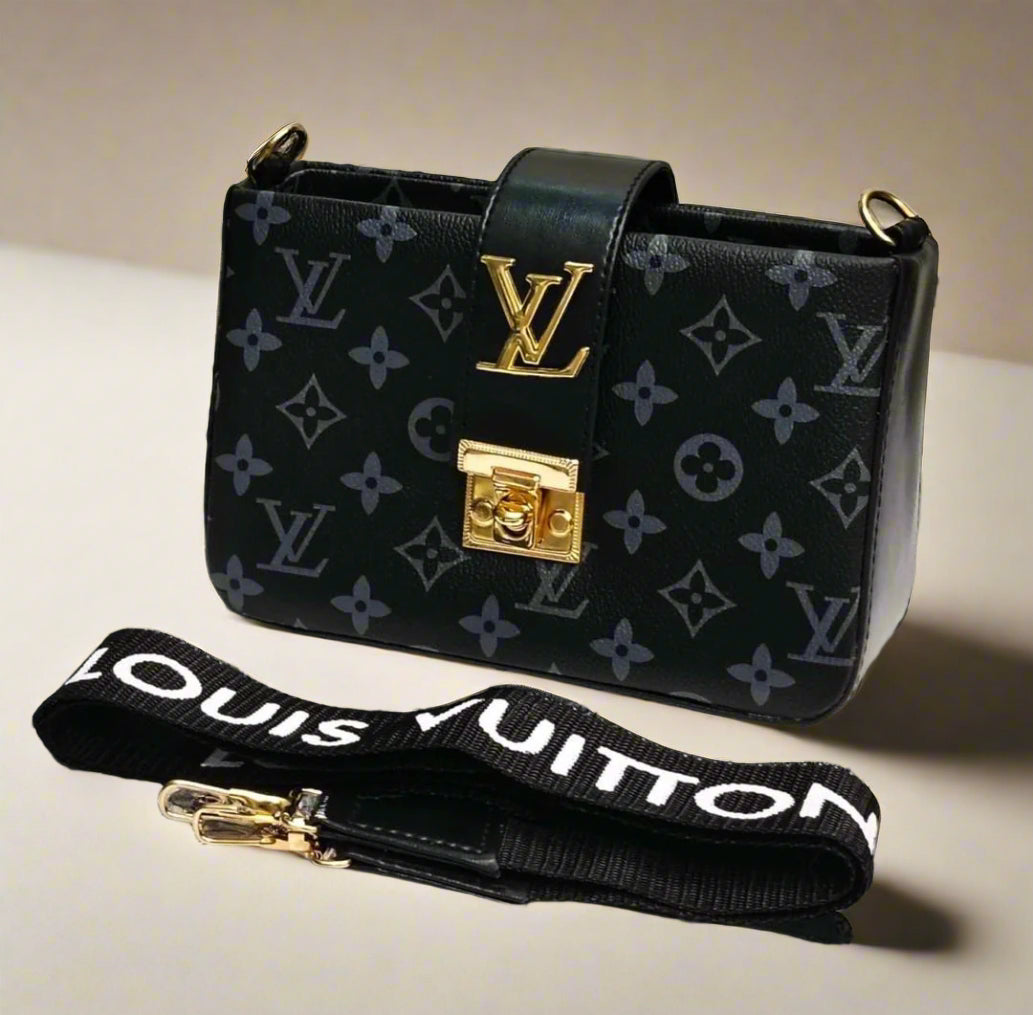 Louis Vuitton handbag with monogram pattern and gold hardware