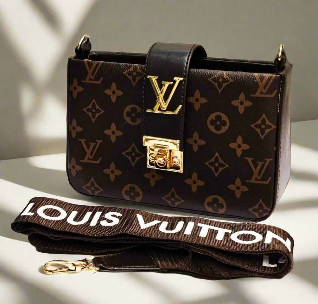 Louis Vuitton handbag with monogram pattern and gold hardware on a beige surface.