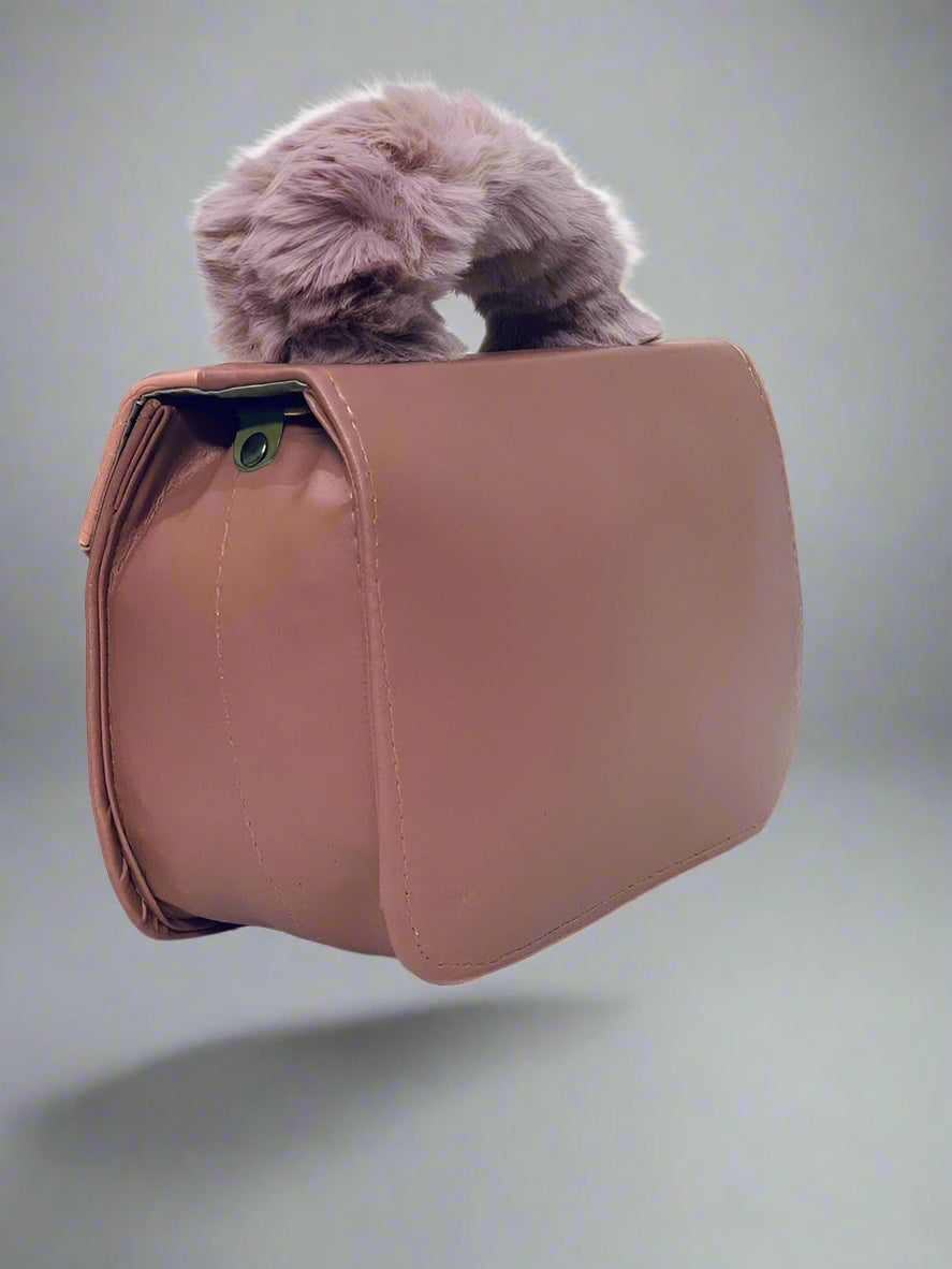 fully handbag on a gray background