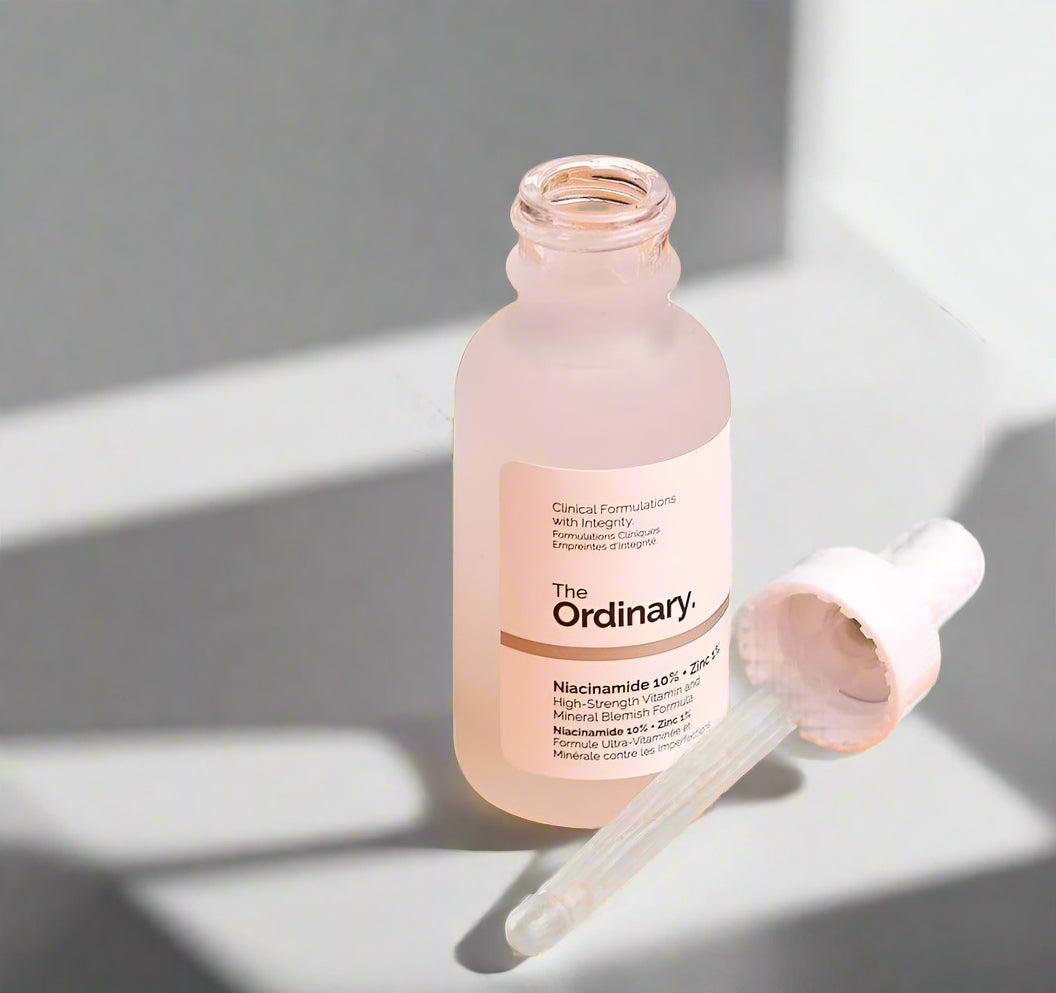 The Ordinary skincare serum bottle with dropper on a light background