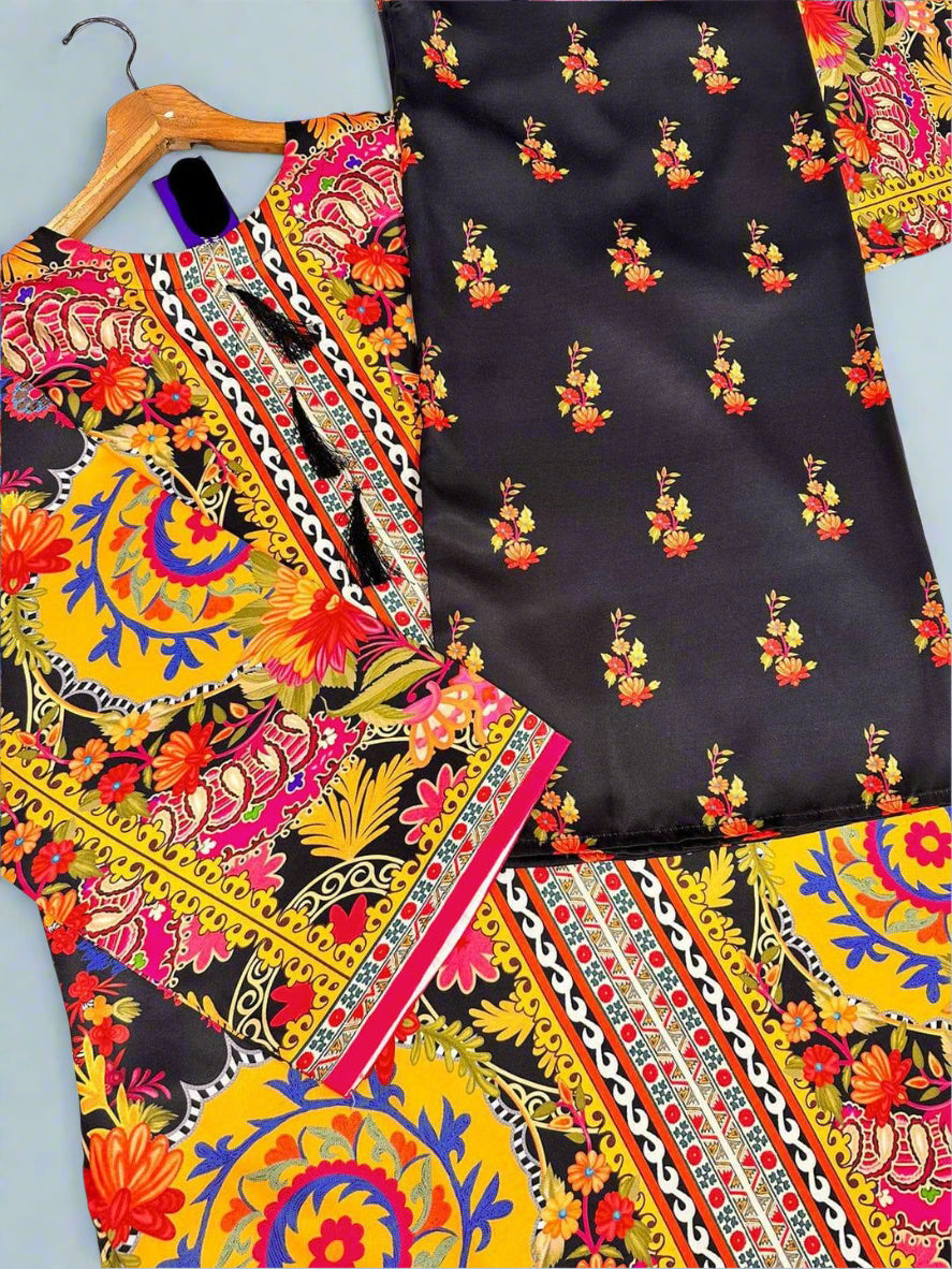 Colorful traditional fabric with intricate patterns on a black background