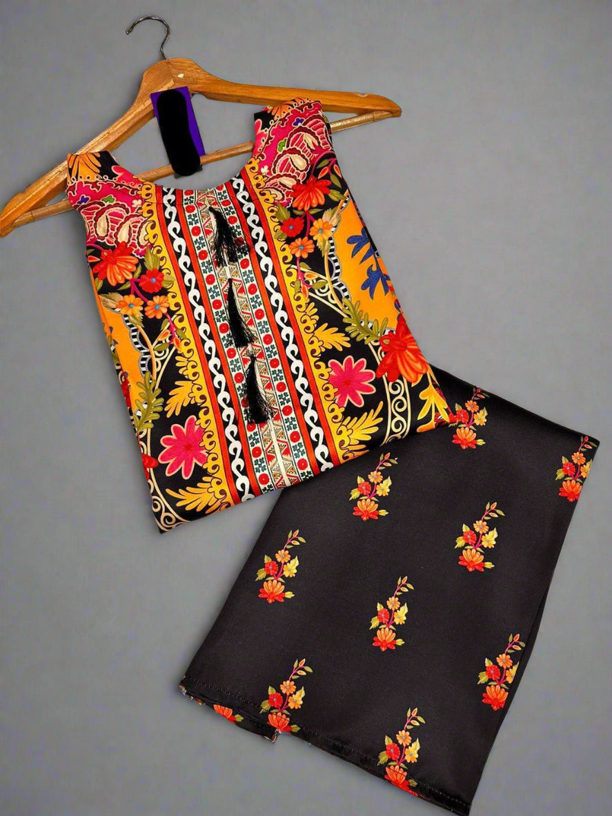 Colorful patterned top and black skirt on a hanger