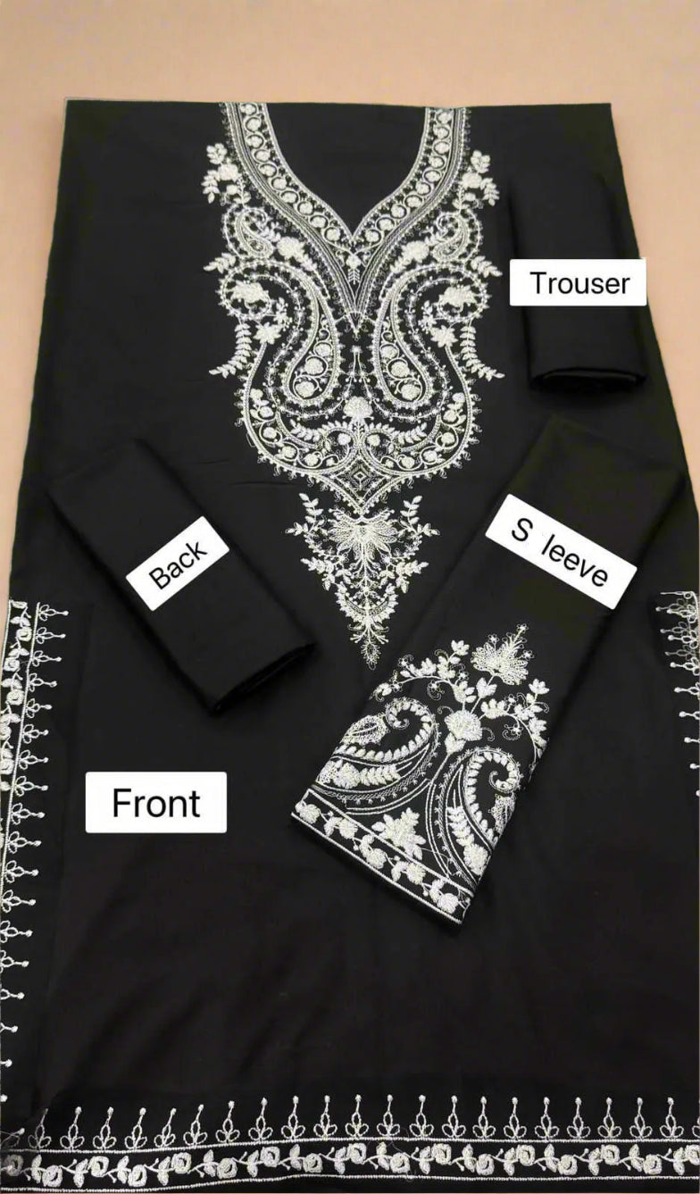 Black outfit with white embroidery labeled 'Front', 'Back', 'Sleeve', and 'Trouser' on a beige background.