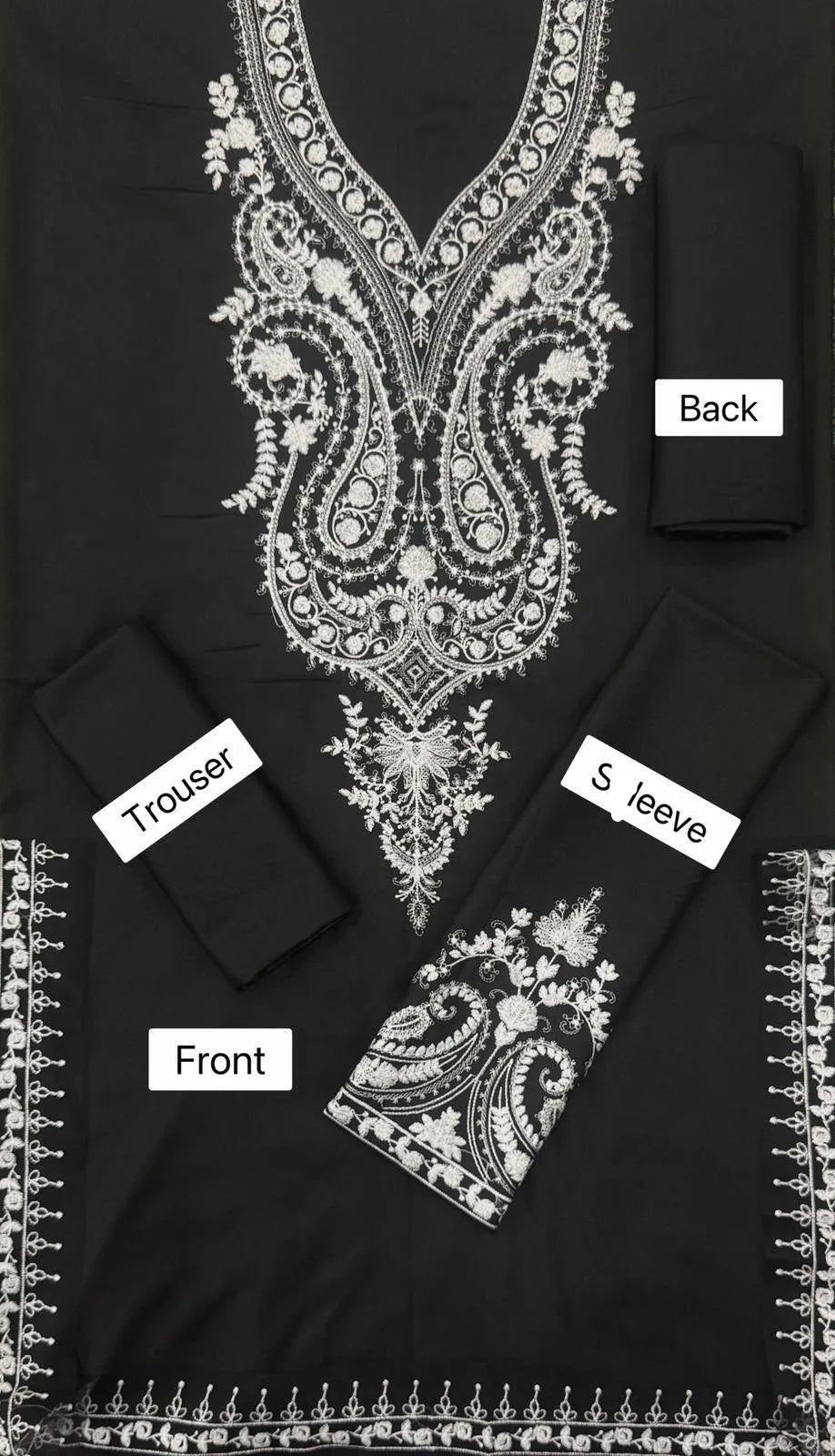 Black garment with white embroidery labeled 'Front', 'Back', and 'Sleeve'.