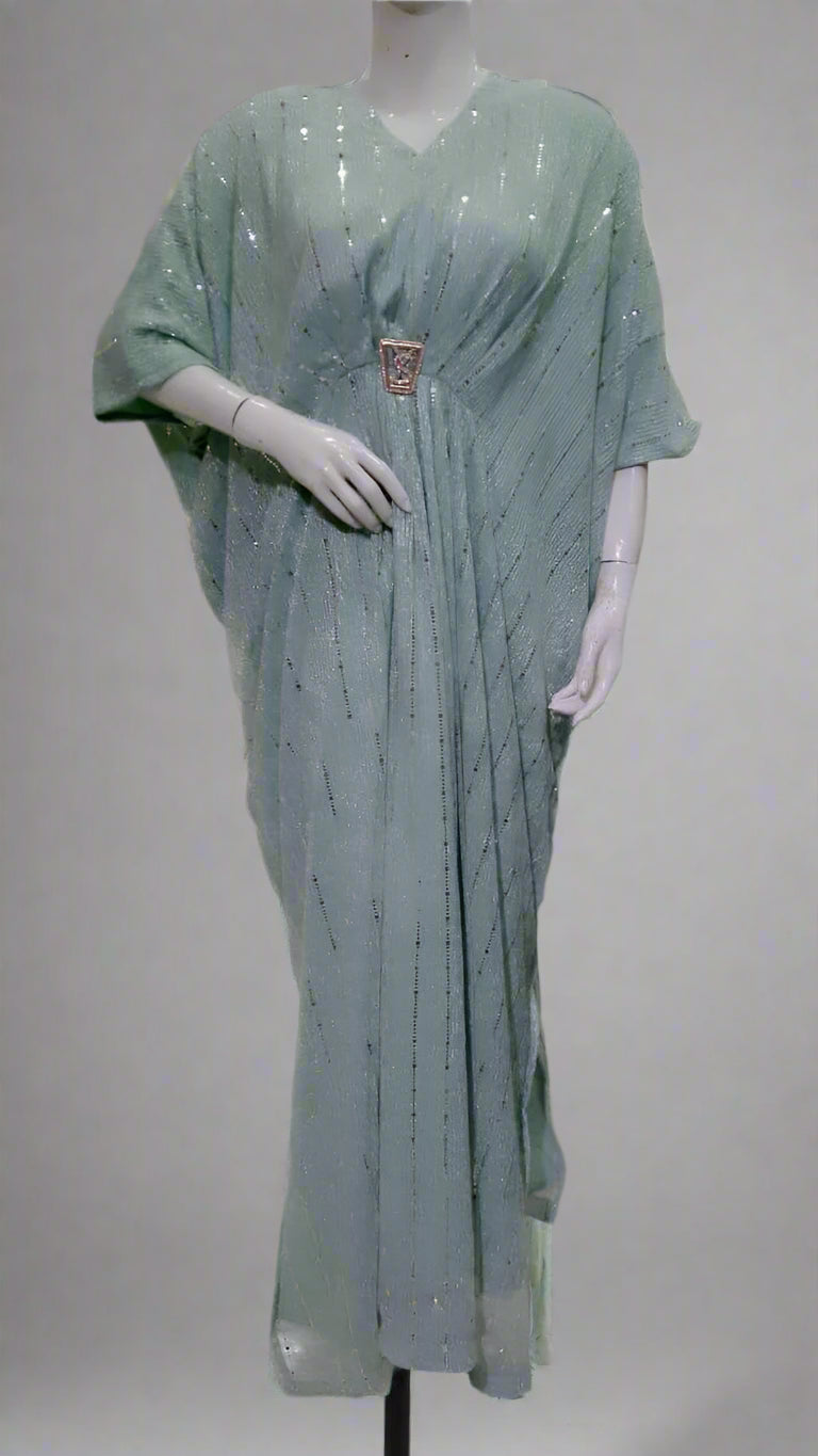 Light green dress on a mannequin