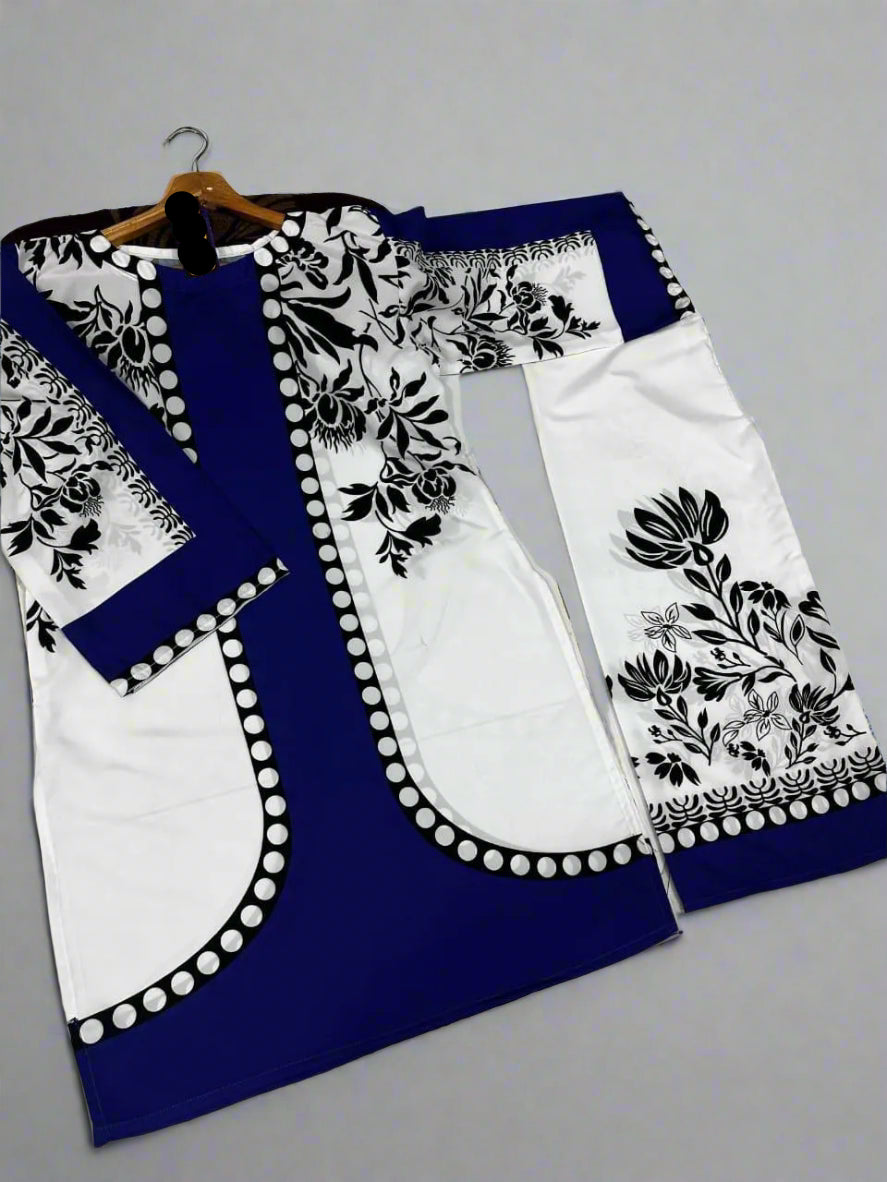 Blue and white traditional outfit with floral patterns on a grey background.