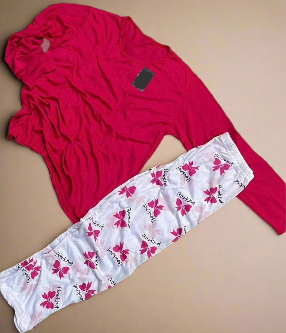 Red long-sleeve shirt and white pants with pink butterfly patterns